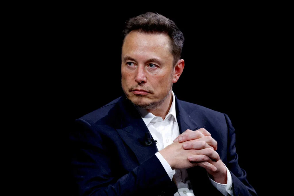 Elon Musk one of the most famous geniuses with autism and asperger's looking deep in thought